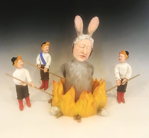 Pat Johnson's "Rabbit Faces the Facts. Clowns Don’t Care.," 2022, at Red & White Gallery. Johnson, whose studio lines the Fayetteville town square, is known for her humorous take on today's times, rendered in clay.