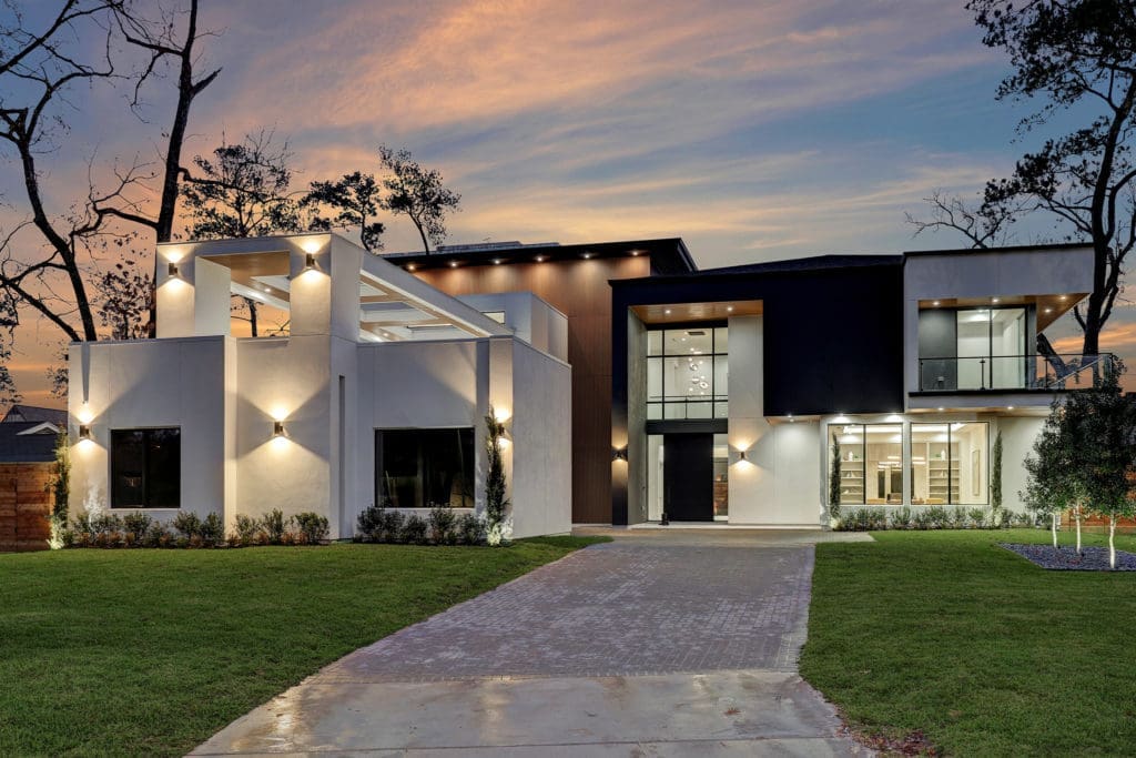 The front entry to Levant Luxury Homes' latest project at 275 Pine Hollow Lane, represented by DeeDee Guggenheim Howes of Compass. (Photo by TK Images)