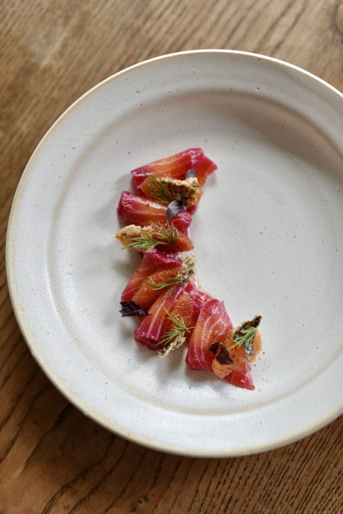 The Sake char ($16), a bright red beet-cured salmon with blood orange and salmon skin “chicharron”. (Photo by Kimberly Park)