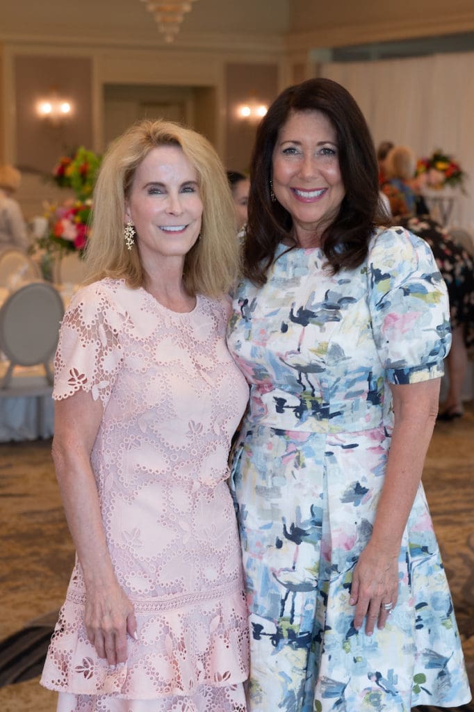 Susan Binney, Heidi Rockecharlie at the Houston Symphony League President's Luncheon and Style Show.  (Photo by Wilson Parish)