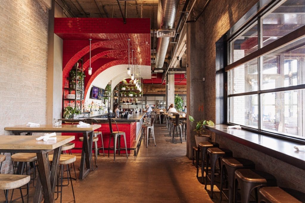 HG Sply Co Fort Worth includes a plenty of river front patio space as well as a smashing interior.
