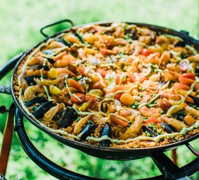 Juan Rodriguez will be bringing along his stunning paella when his tapas bar La Coqueta opens next fall.