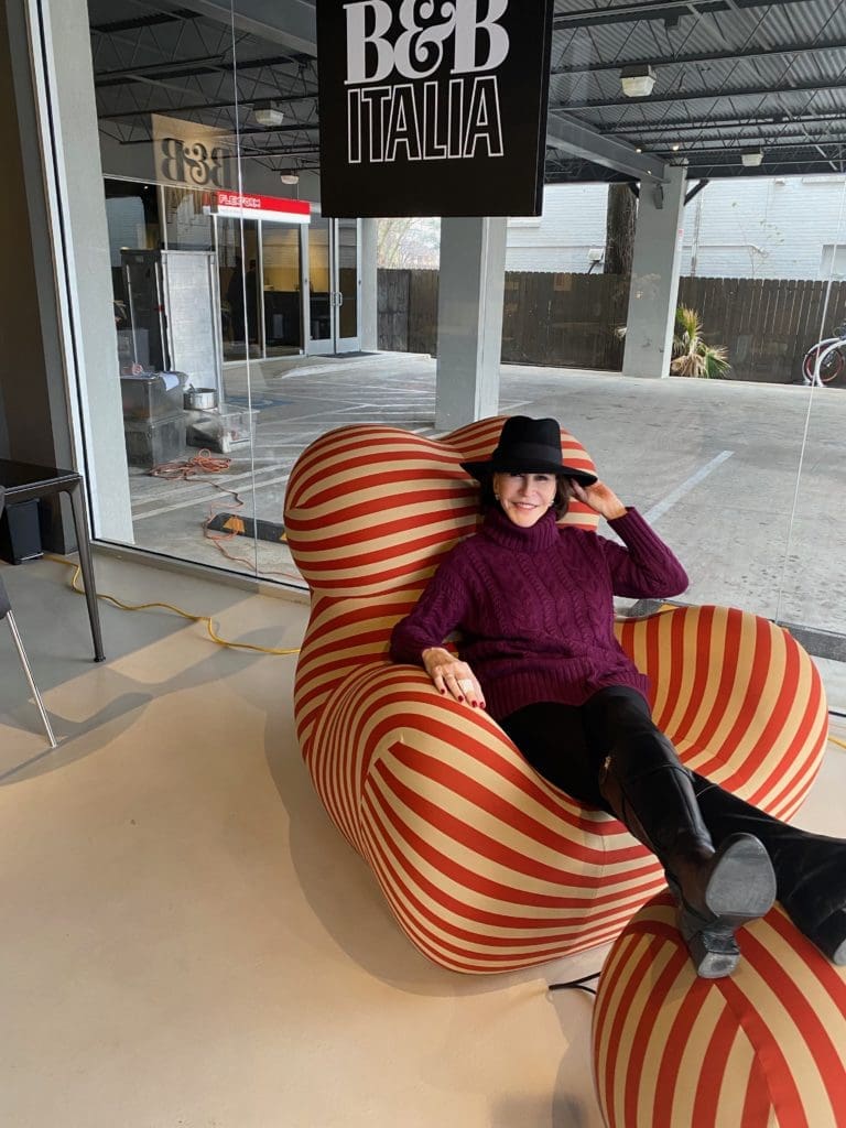 Shelby Hodge takes a ride in  B&B Italia's whimsical Serie Up 2000 chair at BeDesign. (Courtesy photo)