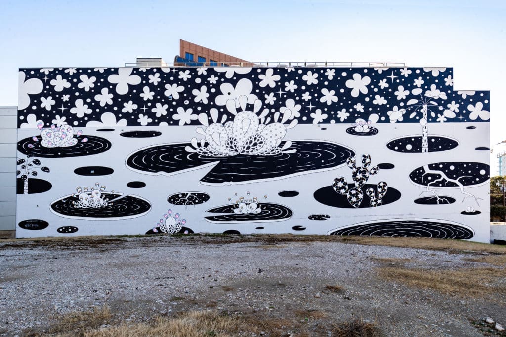 Local artist Will Heron's mural utilizes common themes and aesthetics used throughout his public artworks. (Photo by Exploredinary)