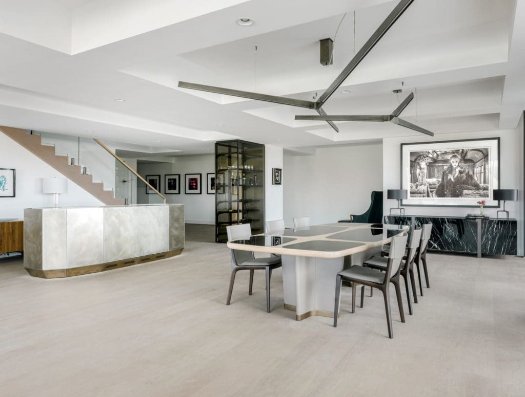 CASA Companies provide everything from artwork to lighting fixtures to furnishings in this turnkey project in The River Oaks condominium.  (Photo by Divya Pande)
