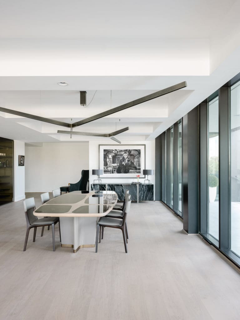 CASA Companies provide everything from artwork to lighting fixtures to furnishings in this turnkey project in The River Oaks condominium. (Photo by Divya Pande)