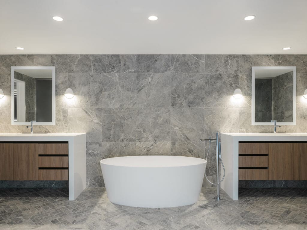 The primary bath in the CASA Companies condo in The River Oaks. (Photo by Divya Pande)