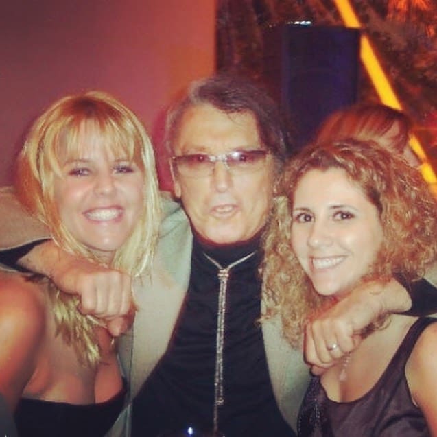 Authors Michele Alexander and Jeannie Long at premiere with Robert Evans in 2003 (Images provided by Michelle Alexander and Jeannie Long)