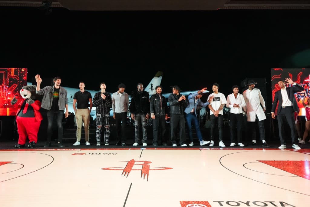 The Houston Rockets in the spotlight at the teams' Clutch City Foundation gala at the Landry's hangar at Hobby Airport.