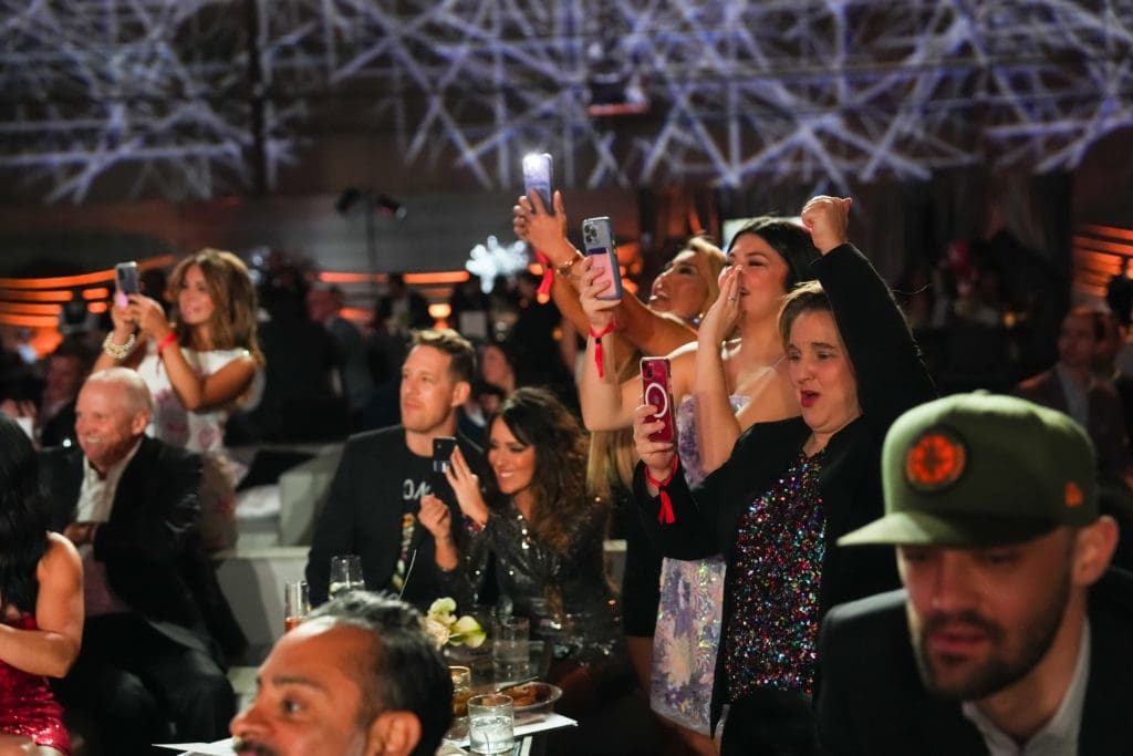 Fans at the Houston Rockets Clutch City Foundation gala at the Landry's hangar at Hobby Airport.