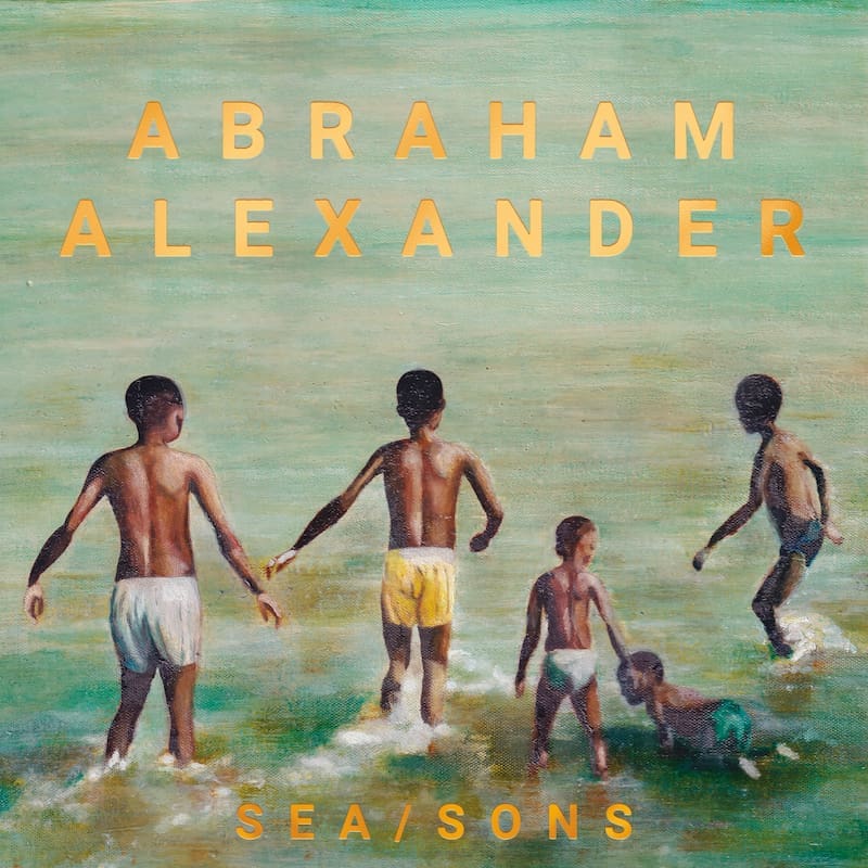 Cover art on his debut album depicts he and his brothers splashing in the ocean during their childhood in Greece. ( Artwork by Elle Caerbert)