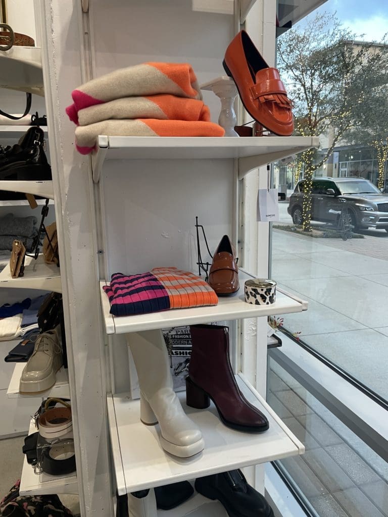 Pink and orange are popular in sweaters and shoes.