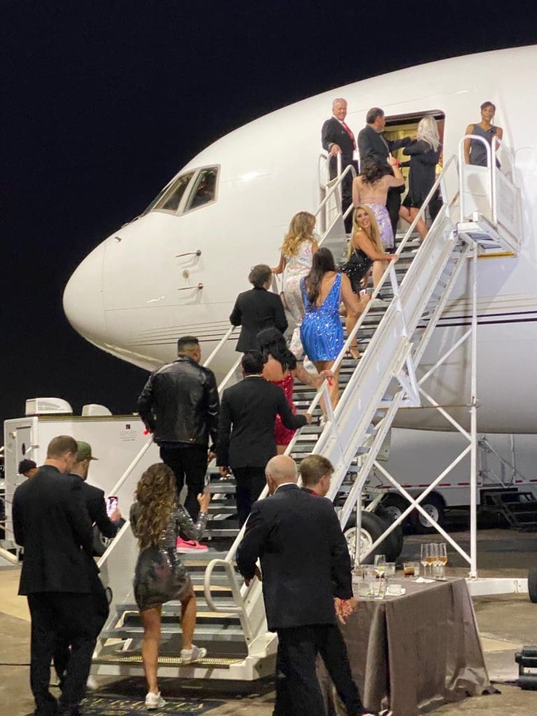 Clutch City Foundation gala guests board the Houston Rockets team jet, a 2019 retrofitted Boeing 767.