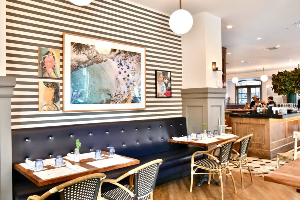 The new refreshed interior of Eloise Nichols includes this punchy green striped wallpaper. (Photo by Alex Montoya)