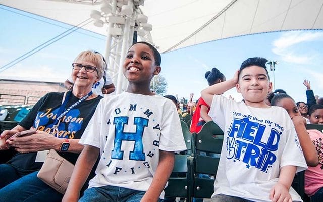 Young boys attend an art event at the Cynthia Woods Mitchell as part of the Cynthia Woods Mitchell Pavilion Art Education programs.