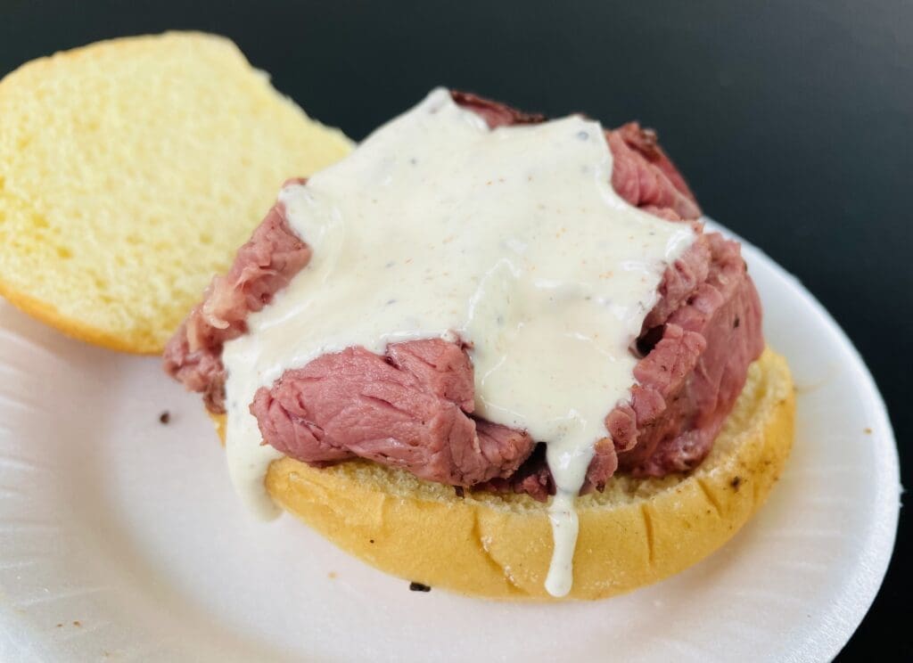 Zavalla's Barbecue piled prime rib on a bun and drizzled it with light horseradish sauce at Ring of Fire. (Photo by Courtney Dabney)