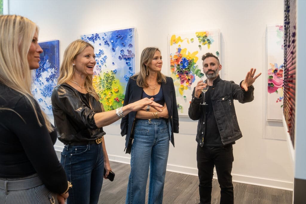 Andrew Zolty, co-founder of BREAKFAST Kinetic Art Studio, with guests. 