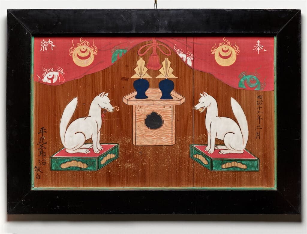A votive painting with two shrine foxes making an offering. Meiji period, dated 1887. Wood, ink and pigments. (Photo by Chadwick Redmon)