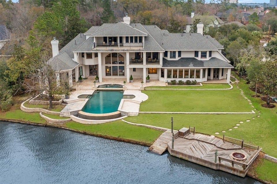 38 S Windsail Place is another impressive waterfront home in The Woodlands.