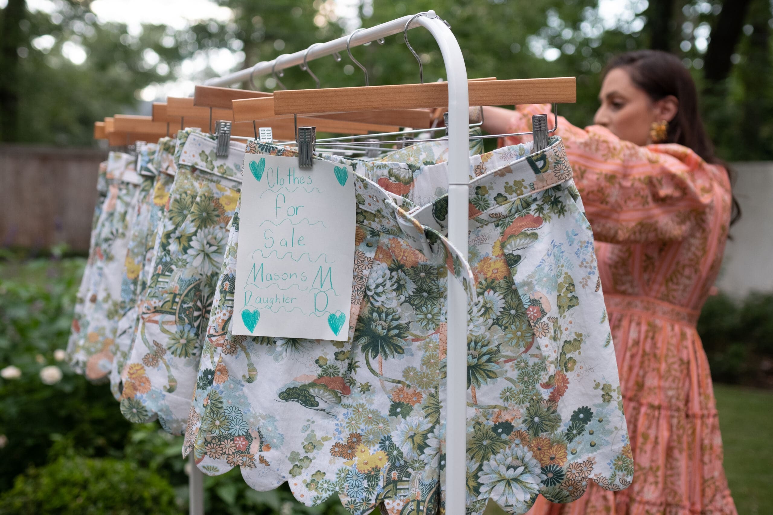 The Zorich kids and friends enjoyed creating signage for the on-sale clothing racks. (Courtesey The Avenue)