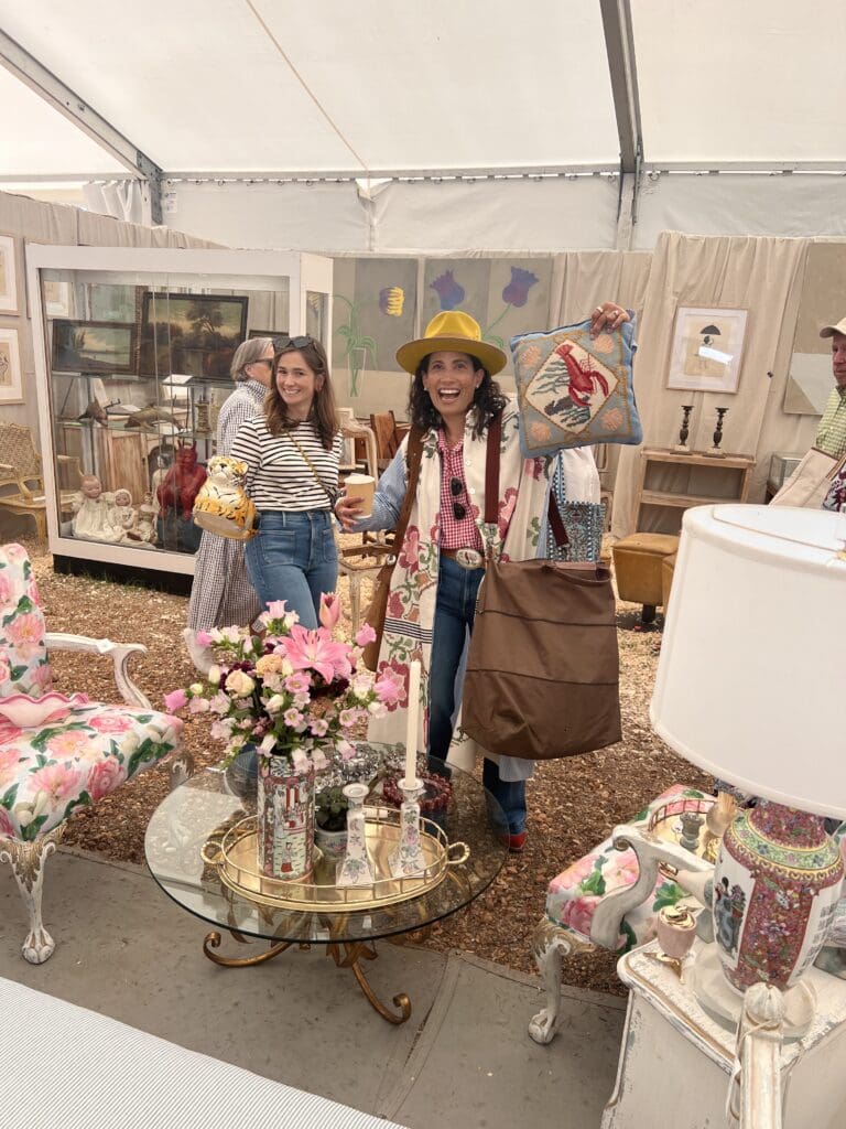 Sally Pretorius Hodge and Catalina Gonzalez Jorba experience the thrill of the hunt at the Marburger Farm Antique Show. 