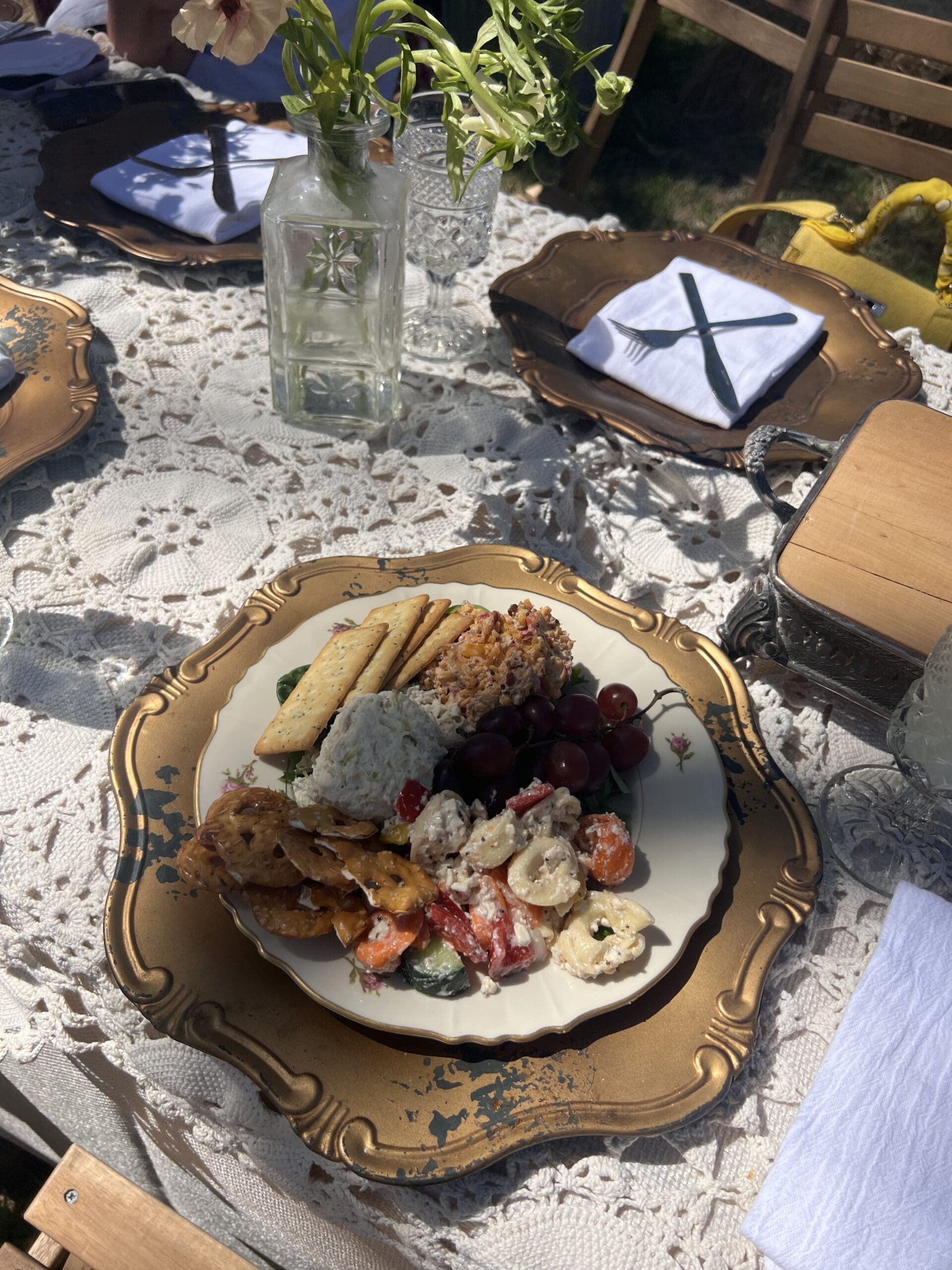 The “Round Top Trio” from Local Roots Round Top included a scoop each of chicken salad, jalapeño pimento cheese, and tortellini pasta salad, all served on a bed of field greens with crackers, pretzel chips, and red grapes.