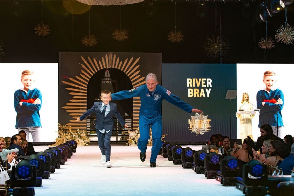 River Bray and American Airlines Pilot (Photo by BFA and Tamytha Cameron)