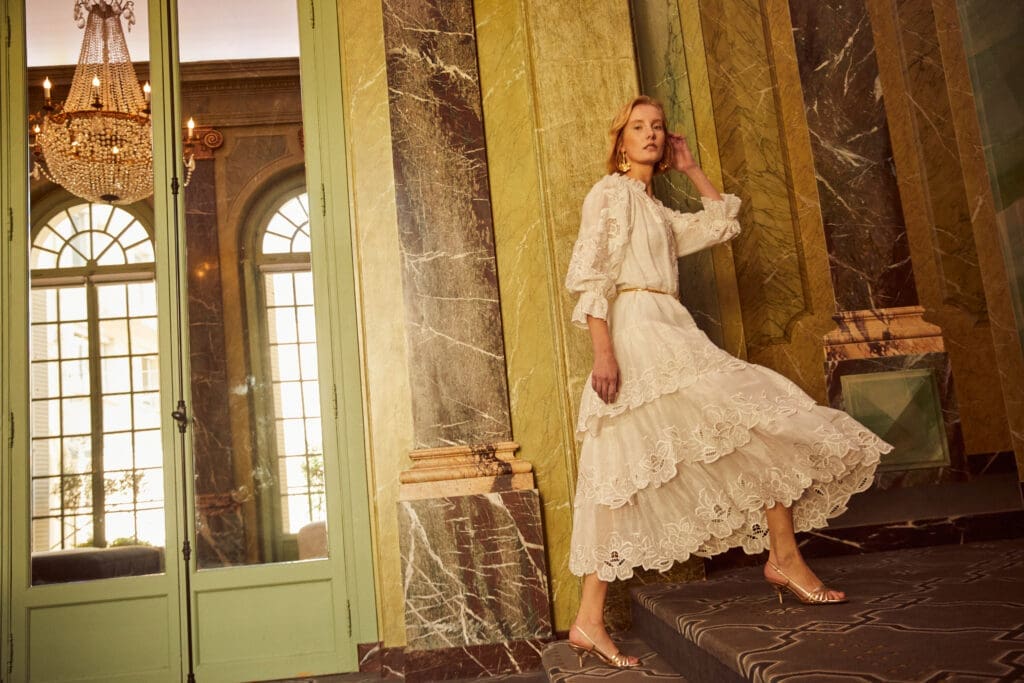 Layered to perfection, the Tamar Dress features intricate embroidery along the neckline, sleeves, and at the end of each flowing layer at the bottom of the dress. 