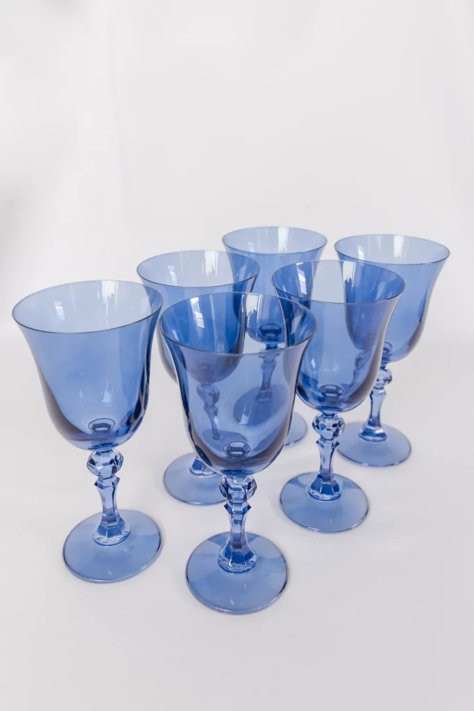 The Estelle Regal Goblet in cobalt blue pairs perfectly with many table styles.