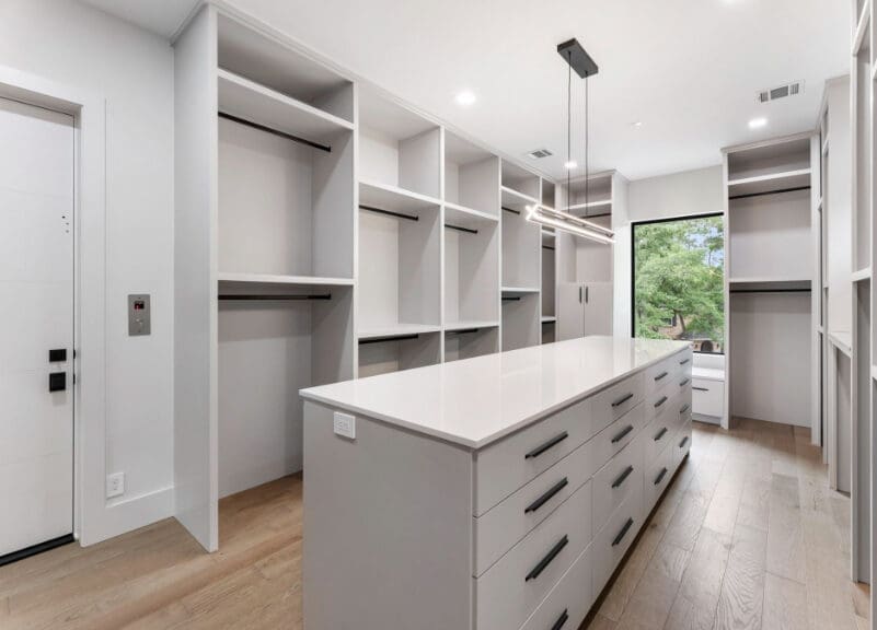 The closet at 114 S. Timber Top is wide open with lots of built-in functionality.