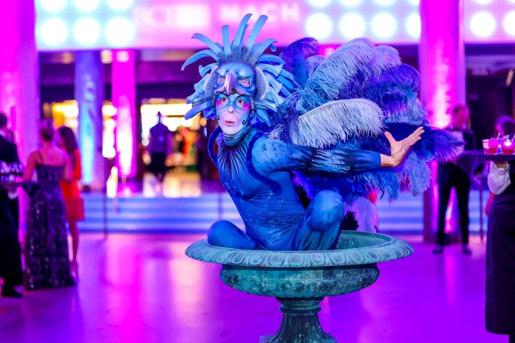 A squawking bird welcomes guests to the Children's Fund 'An Evening of Mystère!' gala (Photo by Wilson Parish)