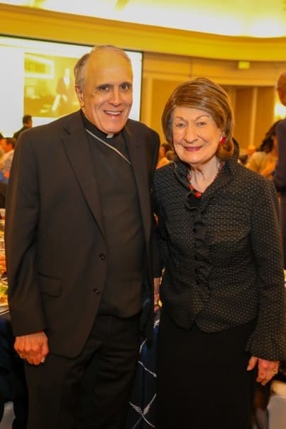 Cardinal Daniel DiNardo, Cora Sue Mach at the Men of Distinction awards luncheon. (Photo by Priscilla Dickson)