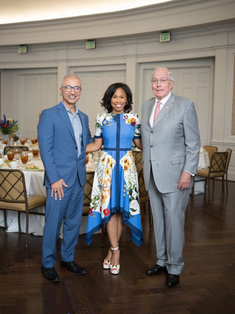 Dr. Esmaeil Porsa, Roslyn Bazzelle Mitchell, John Nau at the CanCare luncheon (Photo by Daniel Ortiz)