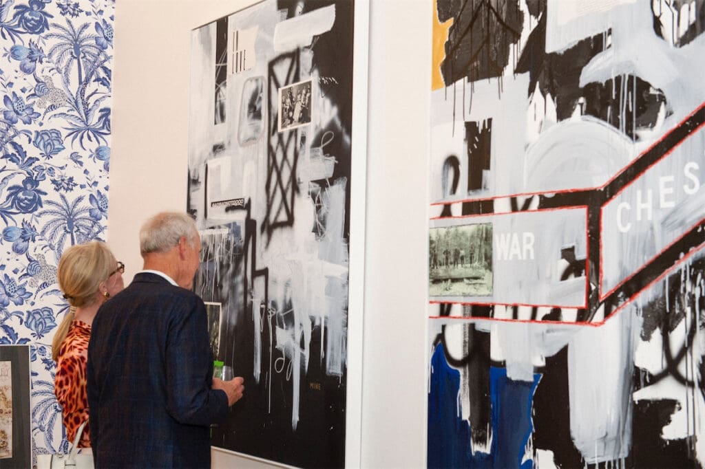 Guests viewing William Atkinson's works (Photo by Mark Anthony Nelson)