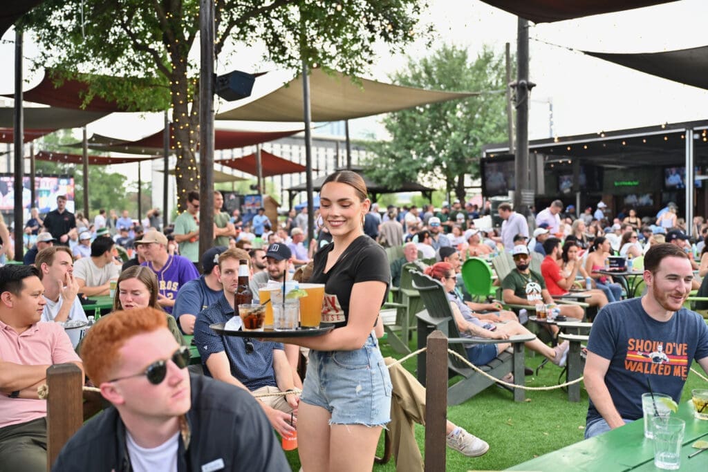 Outside, Kirby Ice House's big screen is great for groups to gather and watch the the Paris Olympics. This is one Woodlands ice house that keeps it cool.
