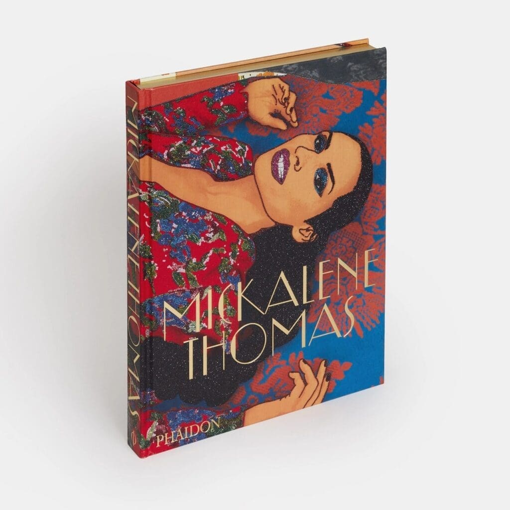 This Mickalene Thomas book, signed by the artist for Houston artist Lovie Olivia and her artist partner Preetika Rajgariah, was mentioned in a 2022 Architectural Digest article on the couple.