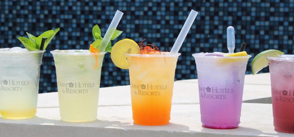 Sip on a refreshing cocktail while taking in the city skyline as your backdrop.