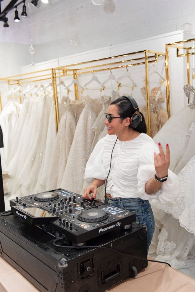 Patricia Quirino, aka DJ RomiQ, on the turntables (Photo by Celeste Cameron)