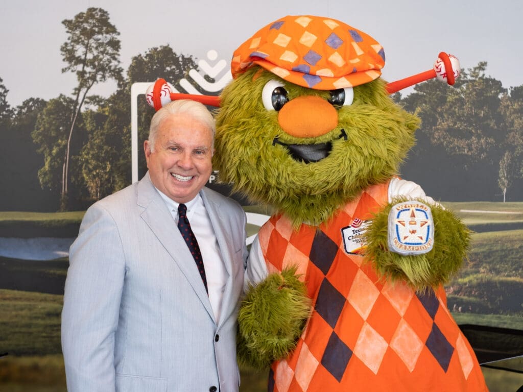 Texas Children's CEO Mark Wallace and Orbit got acquainted with the hospital coming on as the Houston Open's title sponsor.  (Photo by F. Carter Smith)