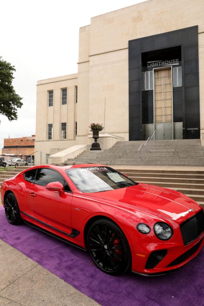 A Bentley out front of downtown Dallas' Lighthouse ArtSpace for AWARE Affair (Photo by Lisa Stewart and Rob Wythe/Wythe Portrait Studio)