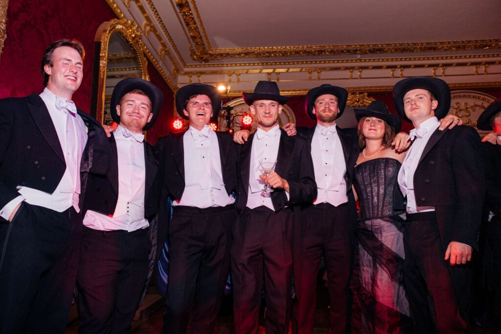 The handsome gents attending the Skylar Pinchal and Oliver Coysh wedding festivities don western hats in a nod to Skylar's Texas heritage.