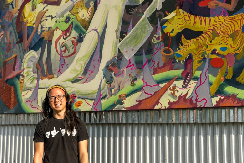 Thomas Tran, creator of "I’m Always Here For You," at Art League Houston (Photo by Alex Barber, Courtesy of Art League Houston)