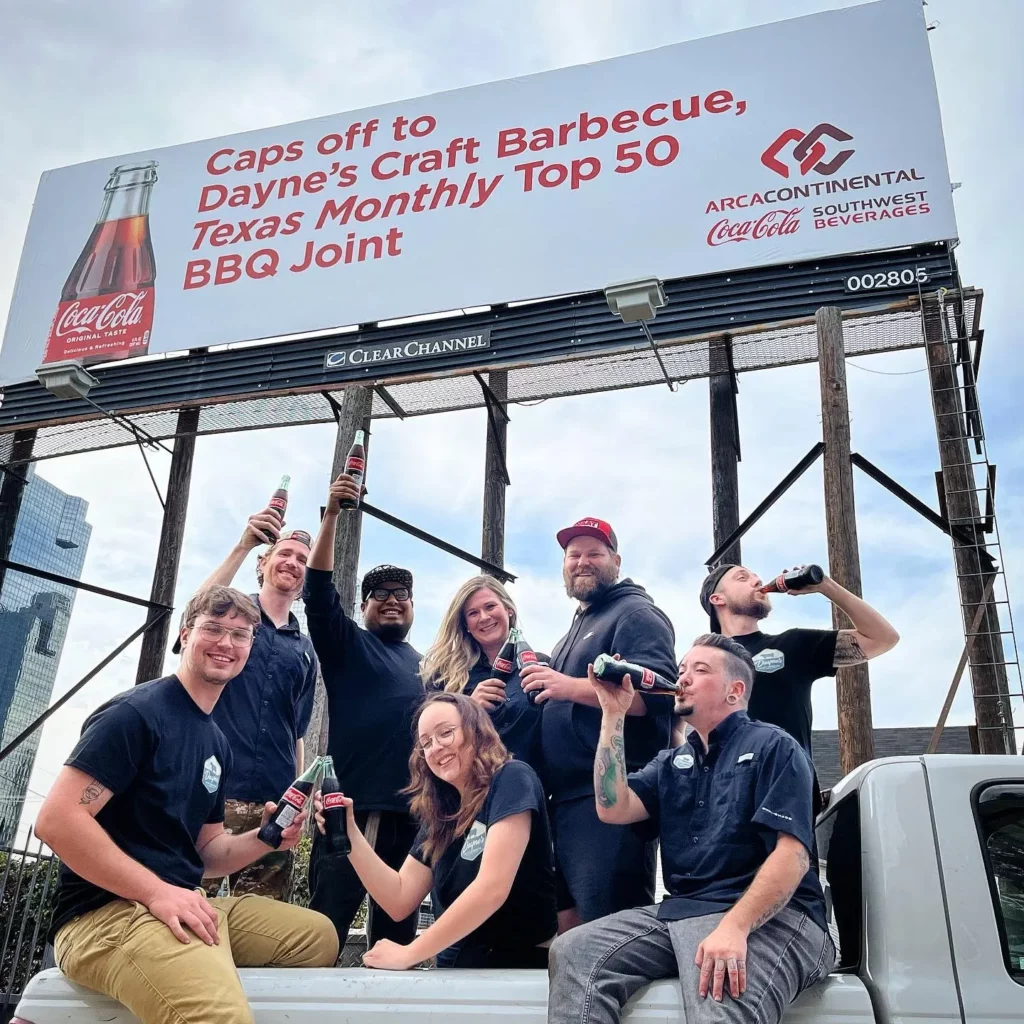 Ashley and Dayne Weaver of Dayne's Craft Barbecue with members of their team