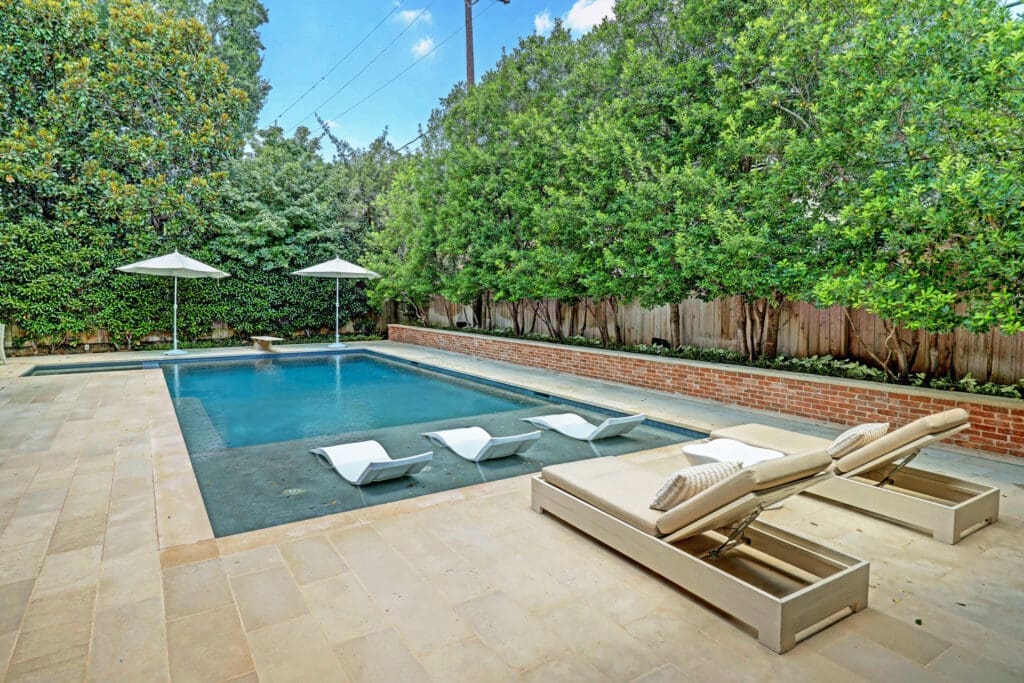 The pool is focal point of the back yard at 3404 Chevy Chase. (Photo by TK Images)