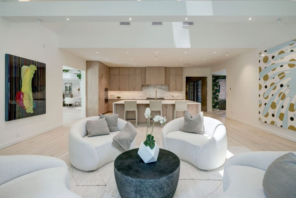 One of many sitting areas in the open floor plan of 3404 Chevy Chase. (Photo by TK Images)