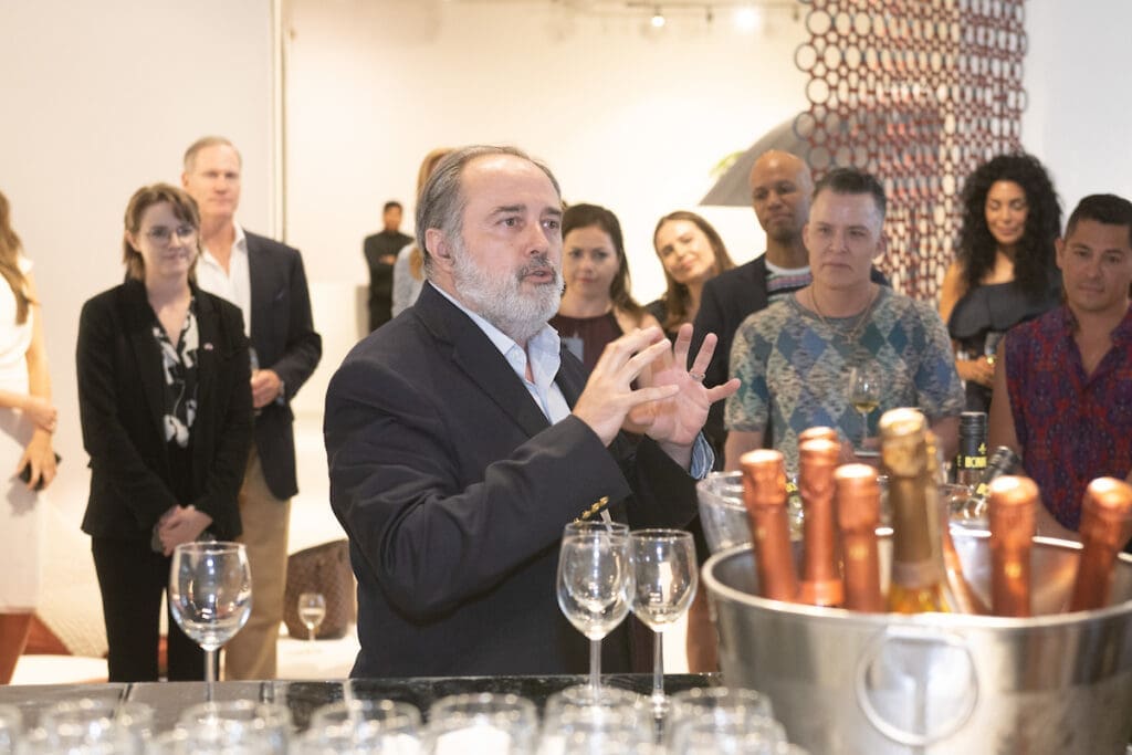 Jean-Francois Bonneté at the BeDESIGN fête introducing new event space Sorellina Rooftop and Frerejean Frères champagne.