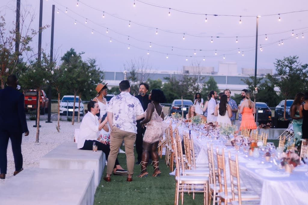 Guests mingling during cocktail hour at the SEBAS Foundation Live Fire Event