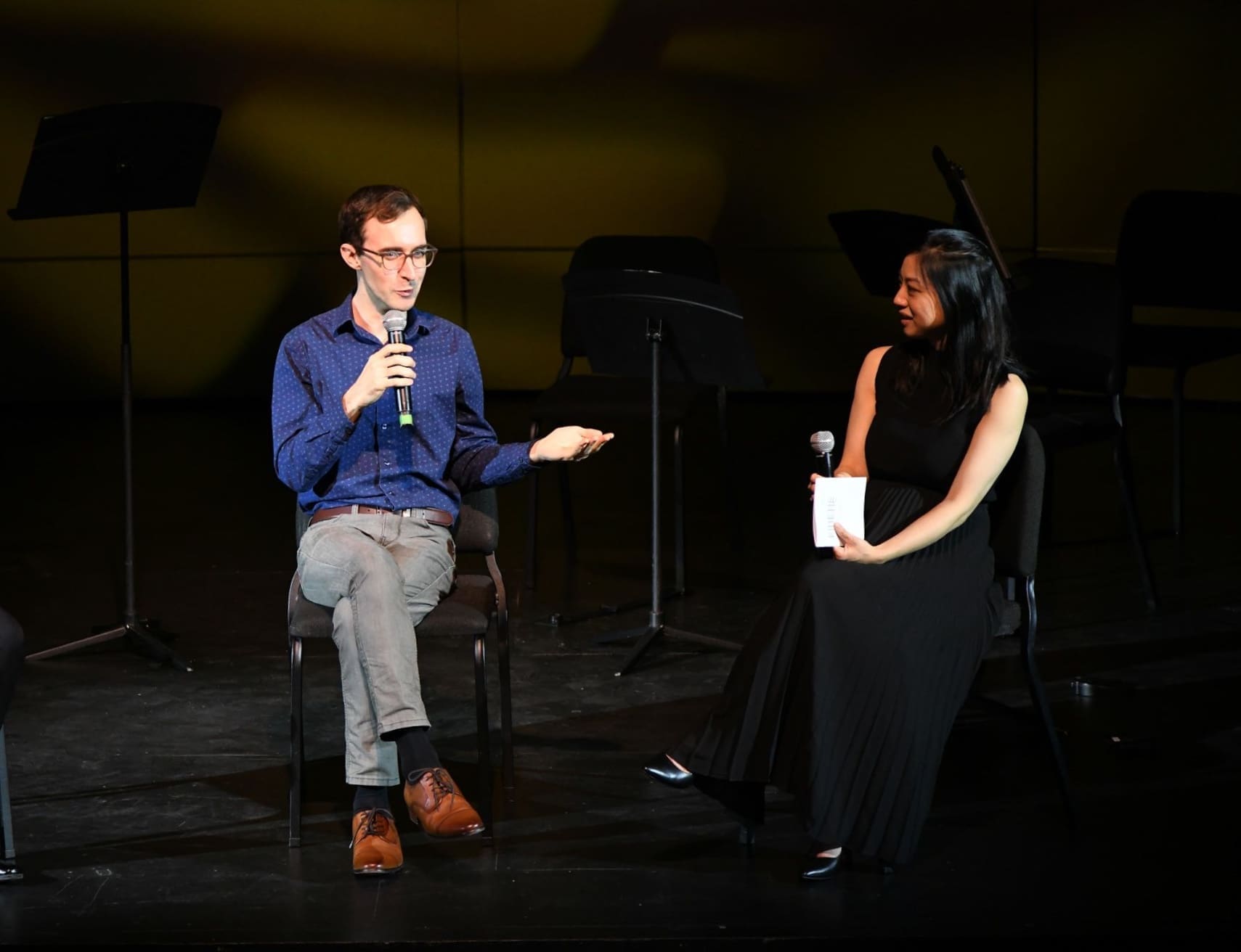 Composer Theo Chandler, in conversation with Kinetic artistic director Natalie Lin Douglas, introduces "Beyond the Sanctuary Walls" to the audience in its May 26th world premiere at Houston's MATCH Theater. (Photo by Jeff Grass. Courtesy Kinetic Ensemble)