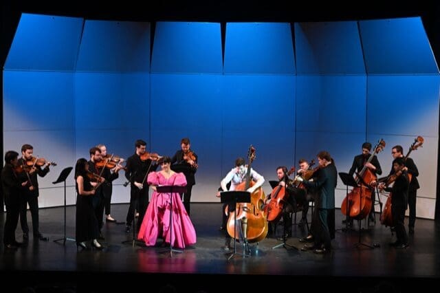Soloists soprano Alexandra Smith and double bassist Charles Paul perform with members of the Kinetic Ensemble in Theo Paul's "Beyond the Sanctuary Walls," in its world premiere at MATCH Theater on May 26. (Photo by Jeff Grass. Courtesy Kinetic Ensemble)