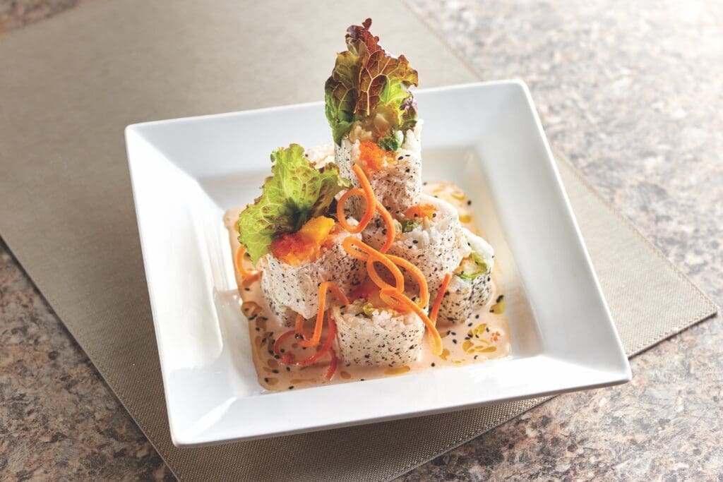The clear lobster sushi are served with a warm sauce at Mastro's Ocean Club.